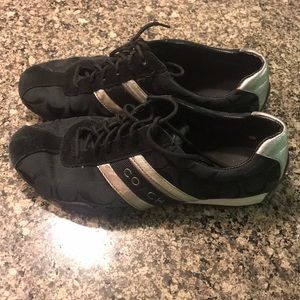 Black and silver Coach tennis shoes